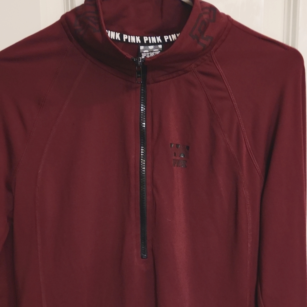 Pink ultimate 1/4 zip crew neck. Medium